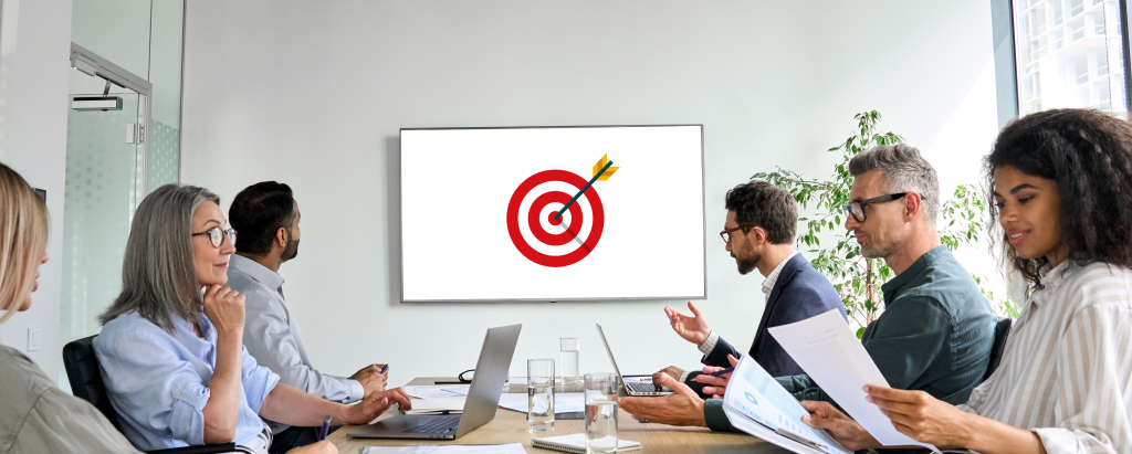An image of a team discussing digital marketing for real estate agents.